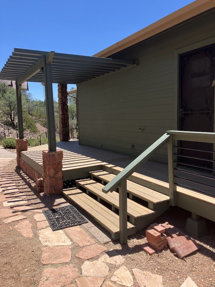 Wraparound deck with pergola and new stairs in the Rim Club area of Payson, Arizona